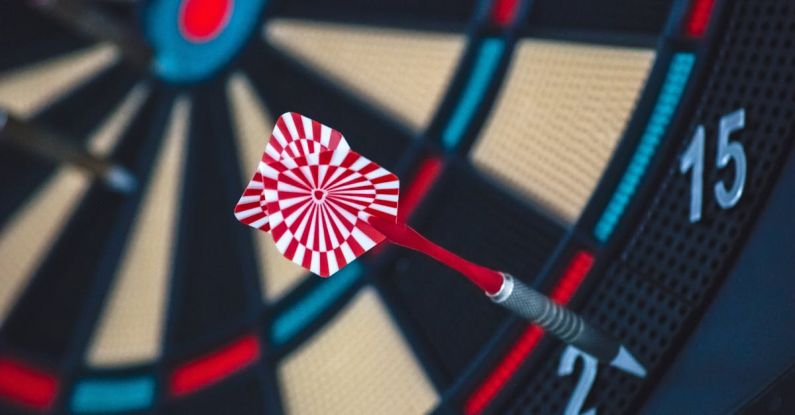Strategies - Red and White Dart on Darts Board