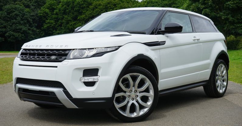 Car - White Land Rover Range Rover Suv on Road