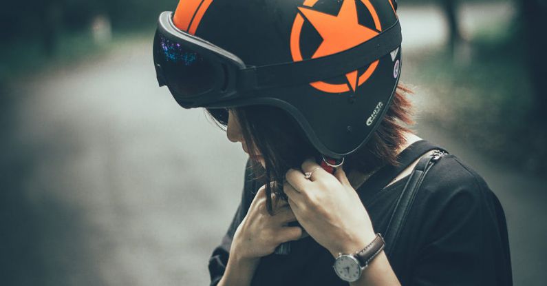 Helmet - Woman on Black and Orange Half-face Helmet