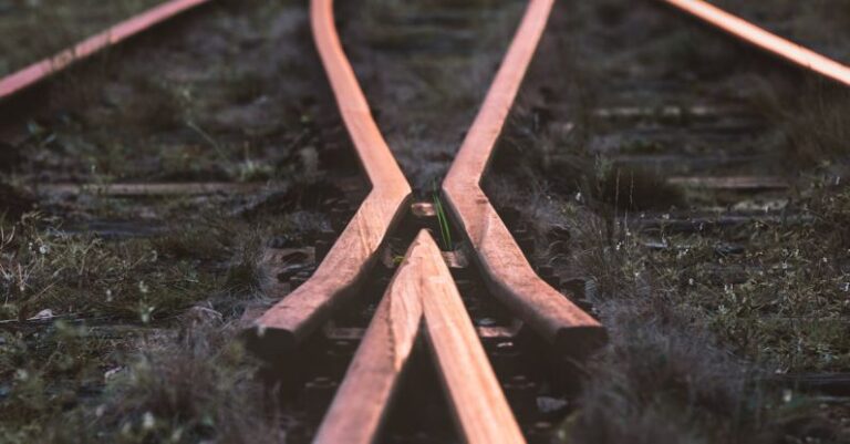 Tracks - Selective-focus Photography of Train Rail